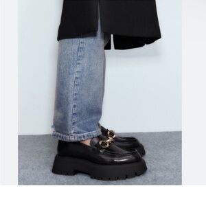 ZARA Shoes | Black Loafers. High vamp and gold metal chain trim at the saddle.